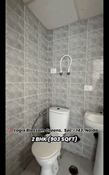 Bathroom in 2 BHK Apartment at Logix Blossom Greens, Sector 143 – for Sale