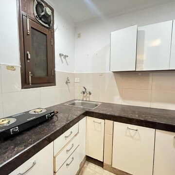 Kitchen in 2 BHK Builder Floor at Freedom Fighters Enclave – for Rent