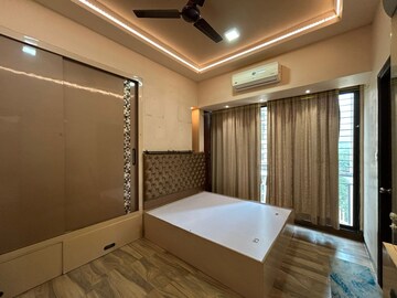 Bedroom in 2 BHK Apartment at Harmony Signature Towers, Owale – for Rent