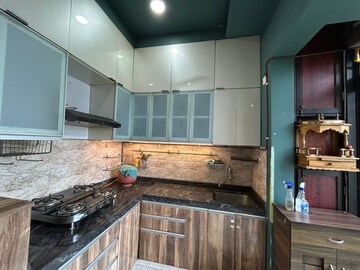 Kitchen in 2 BHK Apartment at Harmony Signature Towers, Owale – for Rent