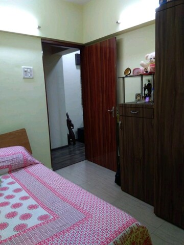 Bedroom in 2 BHK Apartment at Raunak Unnathi Woods Phase 4 And 5, Ghodbunder Road – for Rent