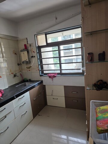 Kitchen in 3 BHK Apartment at Kanchan - Mrig Apartment, Andheri East – for Rent