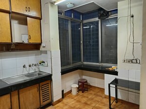 Kitchen in 3 BHK Builder Floor at Auram Floor, South City 2 – for Sale