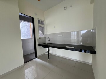 Kitchen in 2 BHK Apartment at Kolte Patil R10, Hinjewadi – for Rent