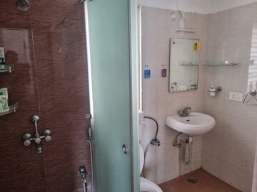 Bathroom in 3 BHK Apartment at Sushant Golf City – for Rent