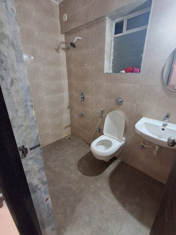 Bathroom in 2 BHK Apartment at Cosmos Habitat, Majiwada – for Rent