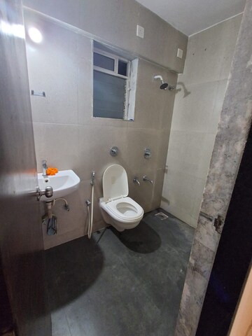 Bathroom in 2 BHK Apartment at Cosmos Habitat, Majiwada – for Rent