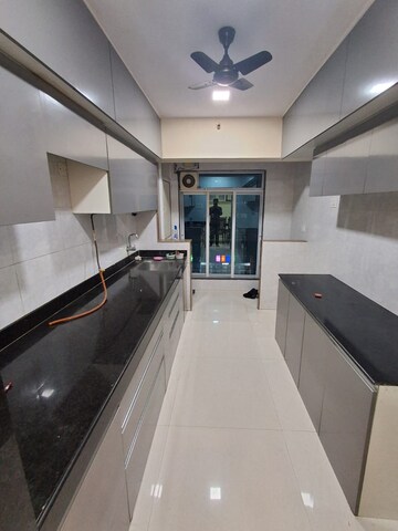 Kitchen in 2 BHK Apartment at Cosmos Habitat, Majiwada – for Rent