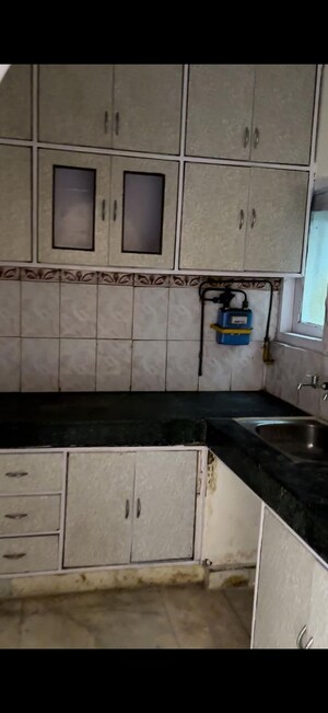 Kitchen in 2 BHK Builder Floor at Khanpur – for Sale