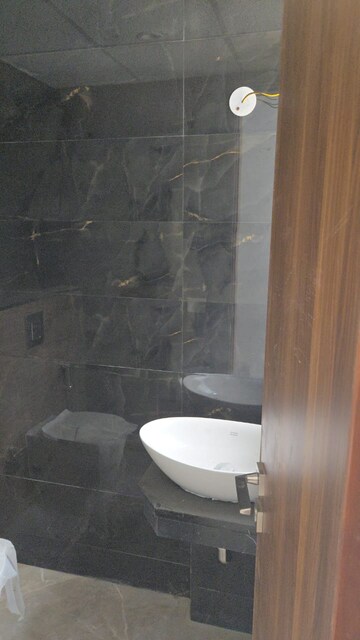 Bathroom in 2 BHK Apartment at Ace Starlit, Sector 152 – for Sale