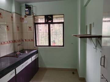 Kitchen in 1 BHK Apartment at Lok Upvan Apartment Phase 2, Vasant Vihar – for Rent