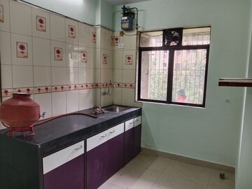 Kitchen in 1 BHK Apartment at Lok Upvan Apartment Phase 2, Vasant Vihar – for Rent