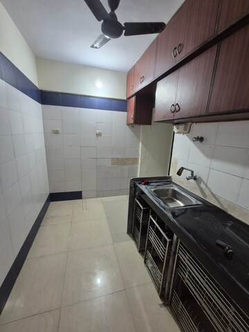 Kitchen in 2 BHK Apartment at Vimla Plaza, Ghansoli – for Rent