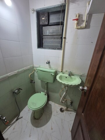 Bathroom in 2 BHK Apartment at Vimla Plaza, Ghansoli – for Rent