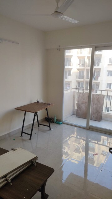Living Room in 2 BHK Apartment at Signature Orchard Avenue 2, Sector 93 – for Rent