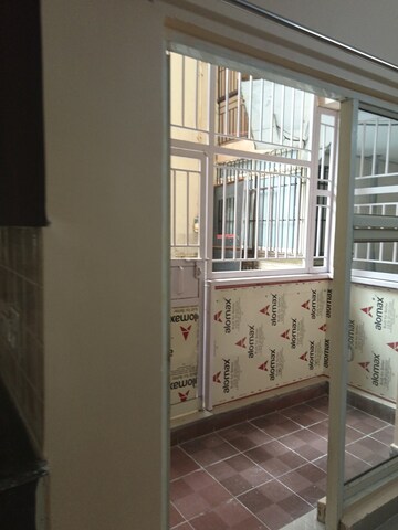 Balcony in 2.5 BHK Apartment at Aims Golf City, Sector 75 – for Rent