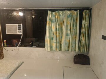 Living Room in 1 BHK Apartment at Goregaon West – for Sale