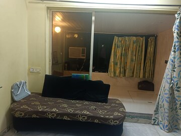 Living Room in 1 BHK Apartment at Goregaon West – for Sale