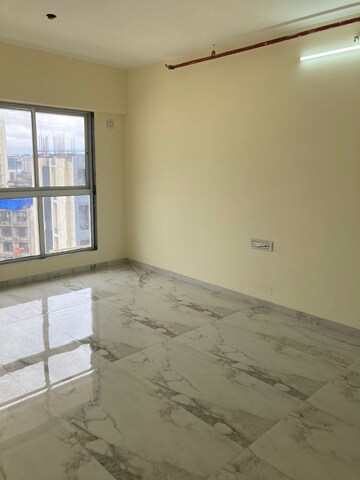 Room in 2 BHK Apartment at Rajvi Ashtavinayak, Andheri West – for Sale