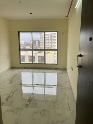 Room in 2 BHK Apartment at Rajvi Ashtavinayak, Andheri West – for Sale