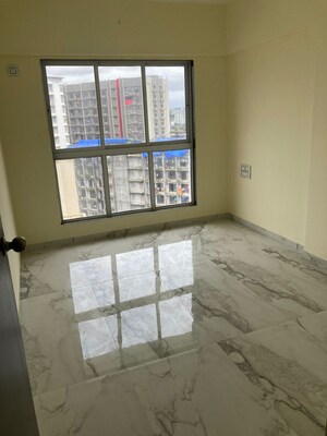 Room in 2 BHK Apartment at Rajvi Ashtavinayak, Andheri West – for Sale