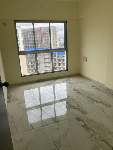 Room in 2 BHK Apartment at Rajvi Ashtavinayak, Andheri West – for Sale