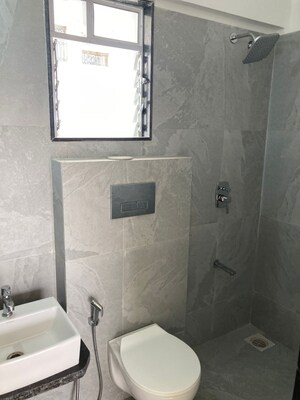 Bathroom in 2 BHK Apartment at Rajvi Ashtavinayak, Andheri West – for Sale