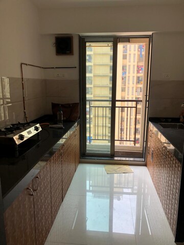 Kitchen in 2 BHK Apartment at Dev Ashoka Apartment, Vartak Nagar – for Sale