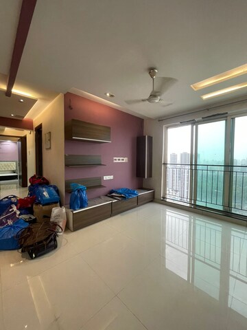 Living Room in 2 BHK Apartment at Rustomjee Urbania Azziano, Thane West – for Rent