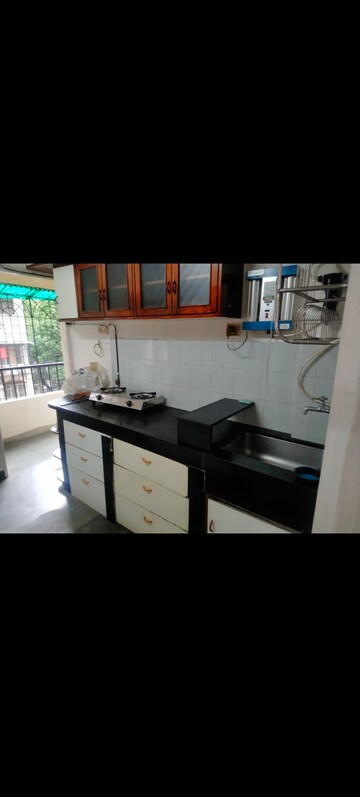 Kitchen in 1 BHK Apartment at Lok Upvan Apartment Phase 2, Vasant Vihar – for Rent