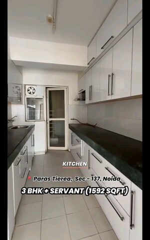 Kitchen in 3 BHK Apartment at Paras Tierea, Sector 137 – for Sale