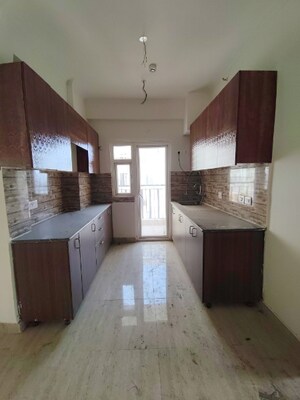 Kitchen in 3 BHK Apartment at Amrapali Terrace Homes, Tech Zone 4 Greater Noida – for Sale