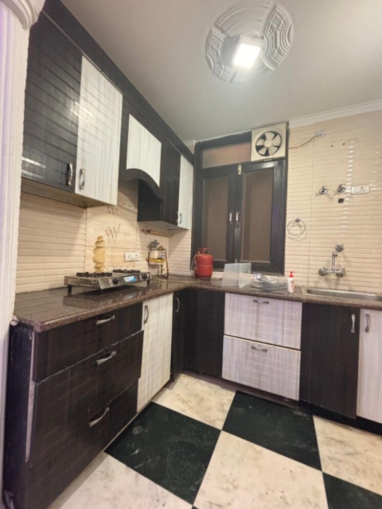 Kitchen, freedom fighters enclave 2 Bedroom 800 Sq.Ft. Apartment In Freedom Fighters Enclave Delhi 8963455