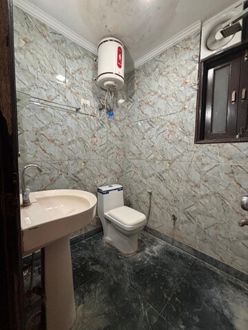 Bathroom in 2 BHK Apartment at Freedom Fighters Enclave – for Rent