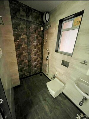 Bathroom in 2 BHK Apartment at Keytech Jiten CHS, Andheri West – for Sale