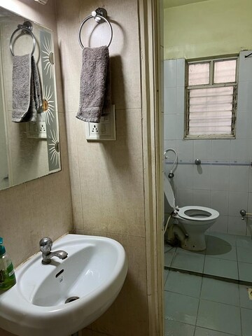 Bathroom in 3 BHK Apartment at Gaikwad Vaidehi Riviera, Bavdhan – for Rent