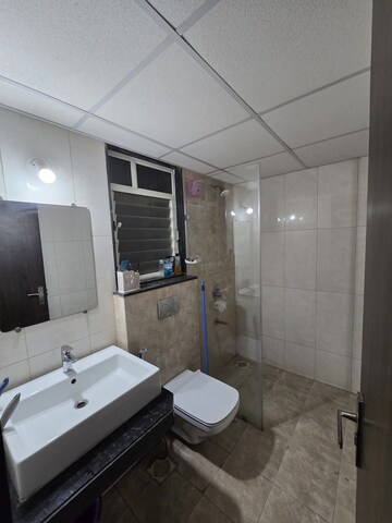 Bathroom in 3 BHK Apartment at Kolte Patil Tuscan Estate, Kharadi – for Rent