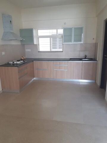 Kitchen in 3 BHK Apartment at Gera Song Of Joy, Kharadi – for Rent
