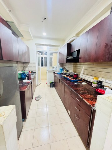 Kitchen in 1 RK Apartment at Aims Golf City, Sector 75 – for Rent