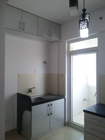 Kitchen in 1 BHK Apartment at Ajmera Infinity, Electronic City Phase I – for Sale
