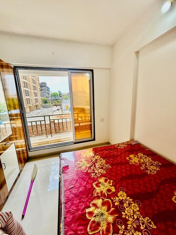 Bedroom in 2 BHK Apartment at Gurukrupa PG Vatika, Badlapur East – for Sale