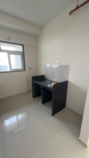Kitchen in 2 BHK Apartment at Ashar Axis, Majiwada – for Rent