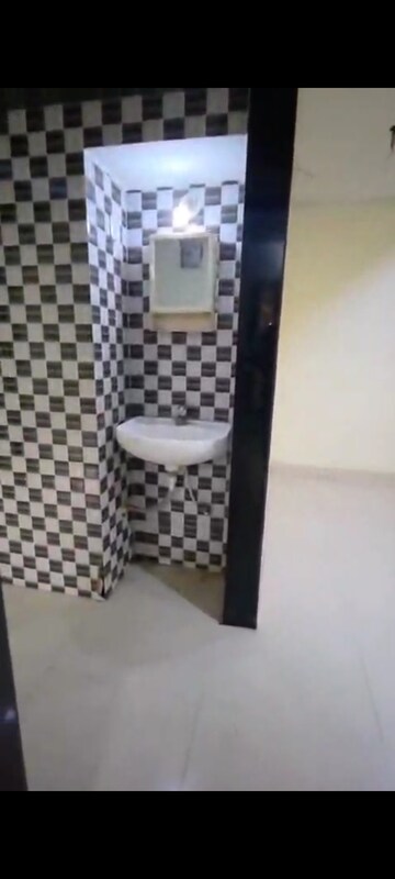 Bathroom in 2 BHK Apartment at Indralok Complex, Mira Road – for Sale