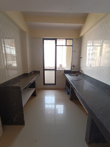 Kitchen in 1 BHK Apartment at Ajmera Rosemary And Rosewood, Kalyan West – for Sale