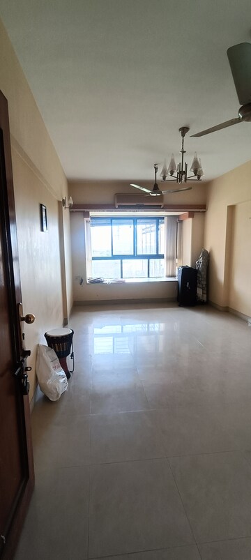 Room in 2 BHK Apartment at Lokhandwala Whispering Palms, Kandivali East – for Sale
