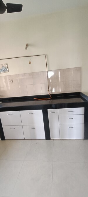 Kitchen in 2 BHK Apartment at Lokhandwala Whispering Palms, Kandivali East – for Sale