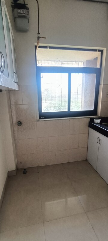 Bathroom in 2 BHK Apartment at Lokhandwala Whispering Palms, Kandivali East – for Sale