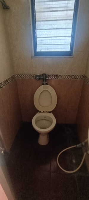 Bathroom in 2 BHK Apartment at Lokhandwala Whispering Palms, Kandivali East – for Sale