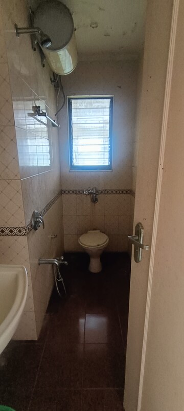 Bathroom in 2 BHK Apartment at Lokhandwala Whispering Palms, Kandivali East – for Sale