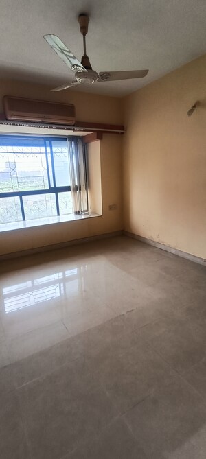 Room in 2 BHK Apartment at Lokhandwala Whispering Palms, Kandivali East – for Sale